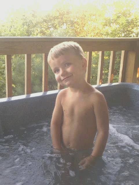 boy in hot tub.jpg